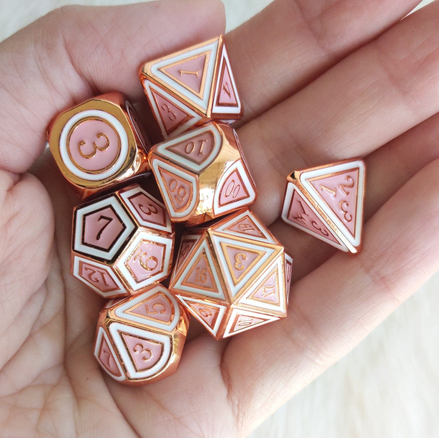 Ostara Metal Dice Set. Copper Plated Pink and White Dice Sets & Games Fennek and Finch