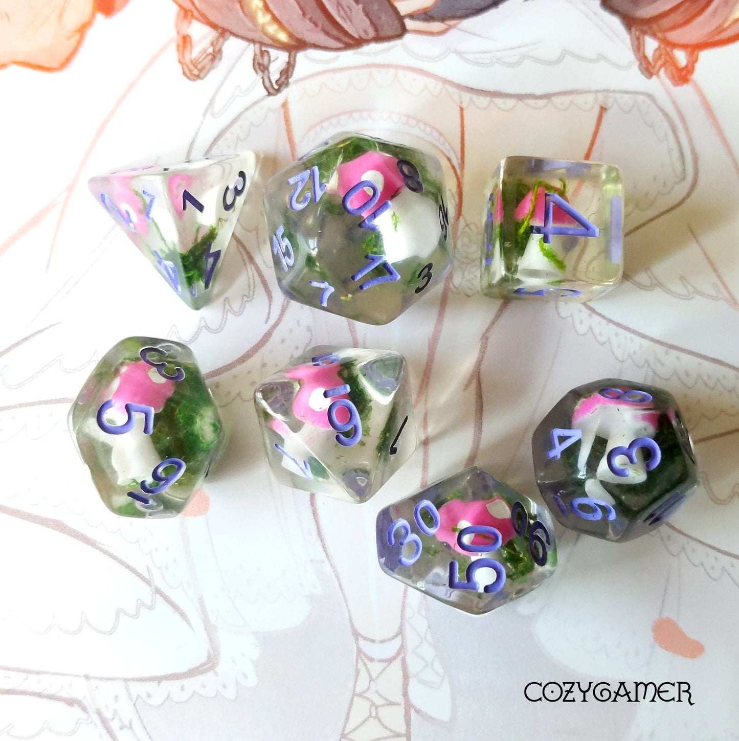 Pink Mushroom and Moss Dice Set for Dungeons and Dragons tabletop games, featuring 7 polyhedral dice on a decorative background.