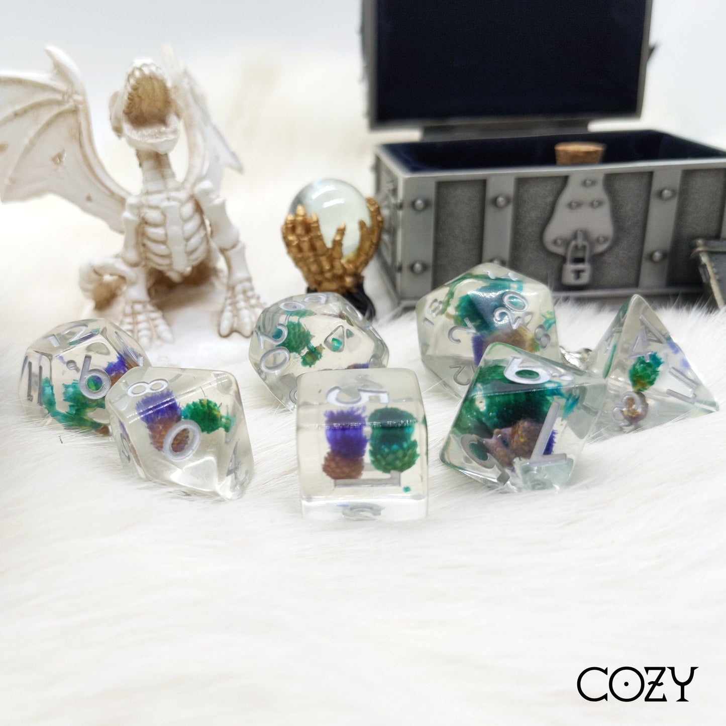 Purple and blue flower dice set with real dried plants in clear resin, 7-piece polyhedral dice for DnD and tabletop RPGs.