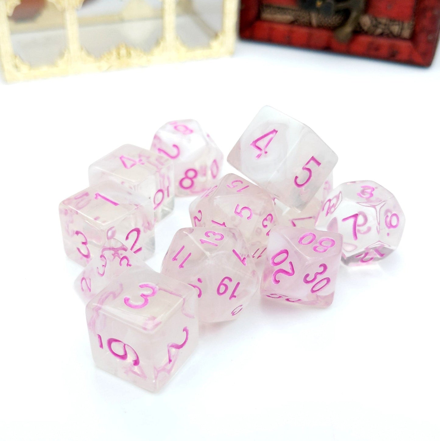 Rosemance 11 piece DnD dice set with pink numbers, featuring acrylic design and extra D20 and 4 D6 dice for tabletop RPG games.