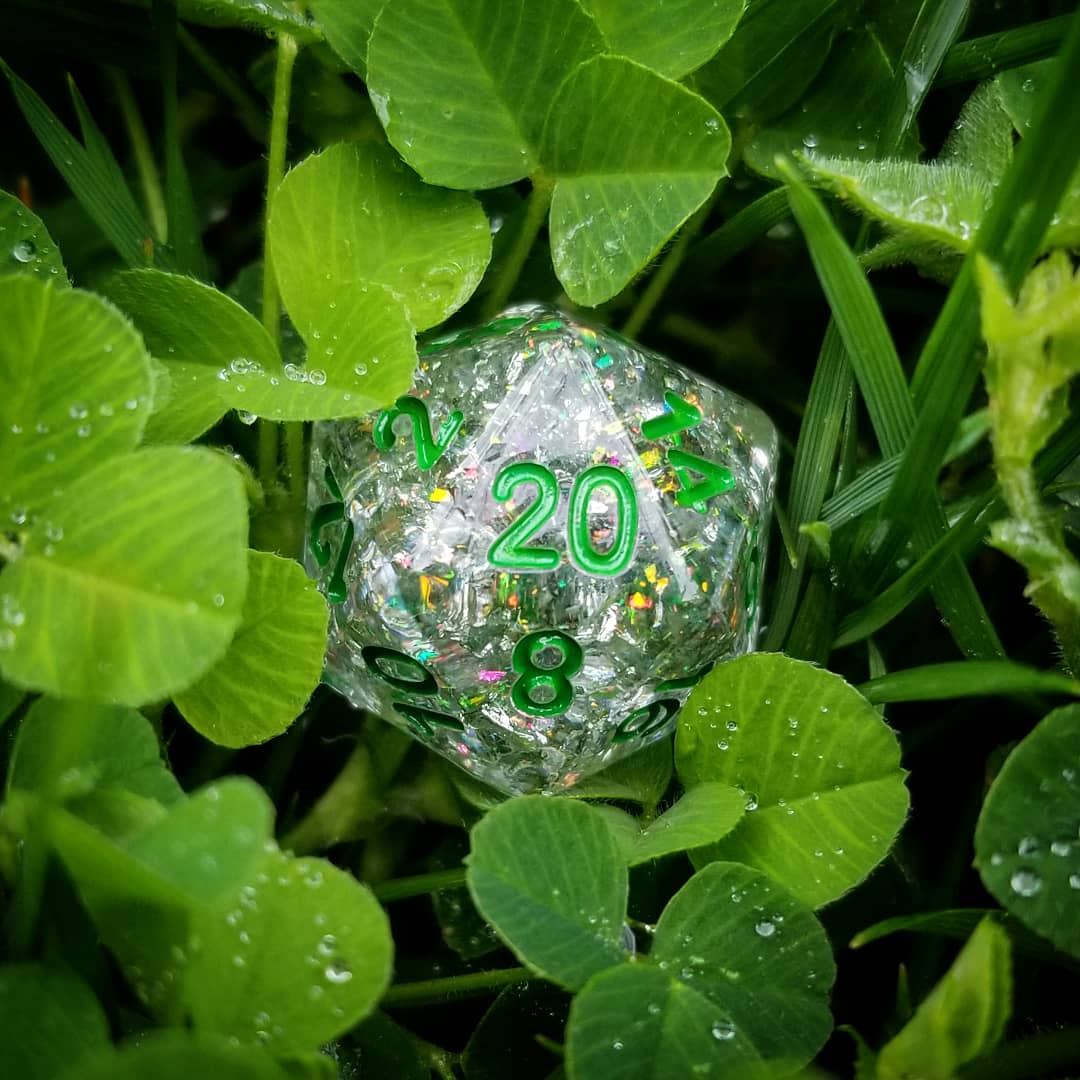 Serpent Dice Set – 7-Piece Clear Opal Flake Silver Foil Green Font DnD Dice Dice sets Fennek and Finch