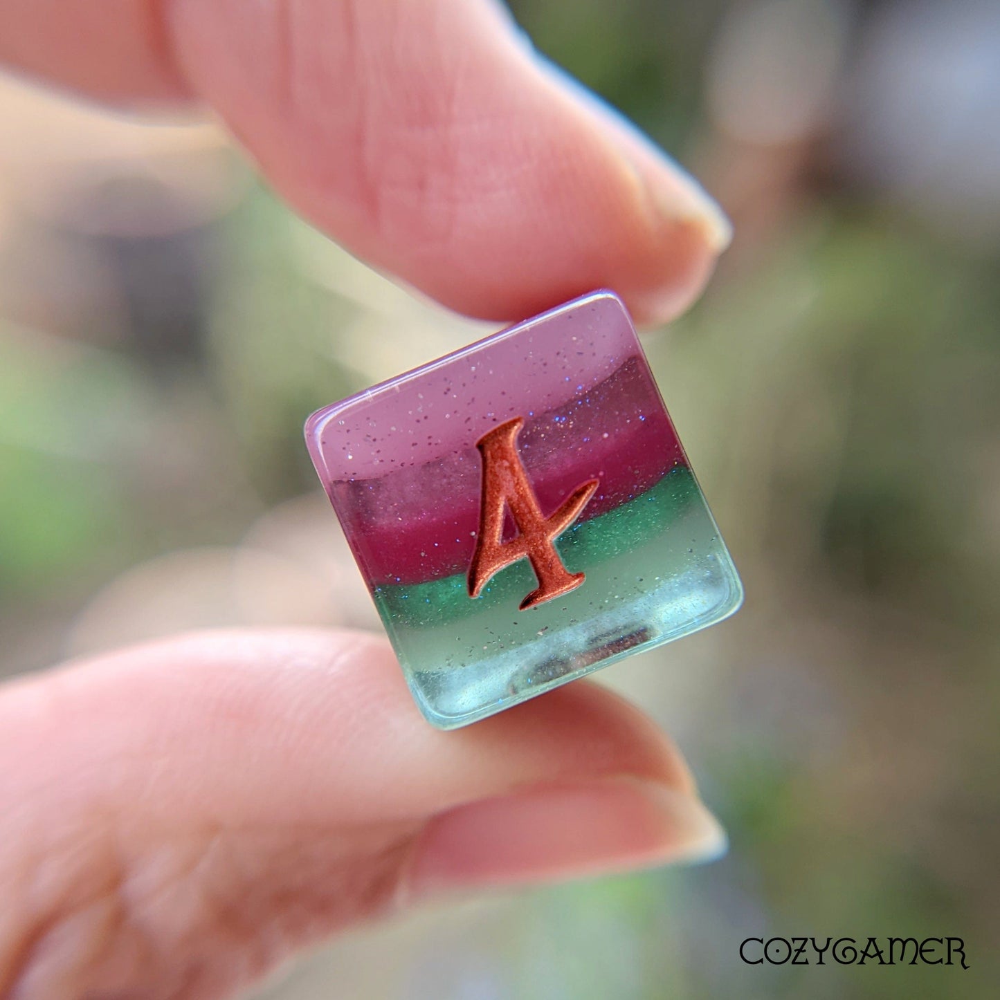 Shimmering Fluorite, a green and purple layered DND dice set Dice sets Fennek and Finch