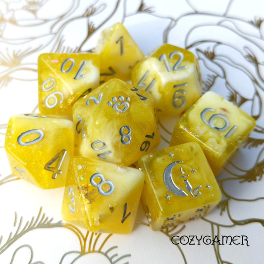 Sunlight 8 Piece Dice Set. Clear Yellow and White Marble, with Glitter and Foil Dice sets Fennek and Finch