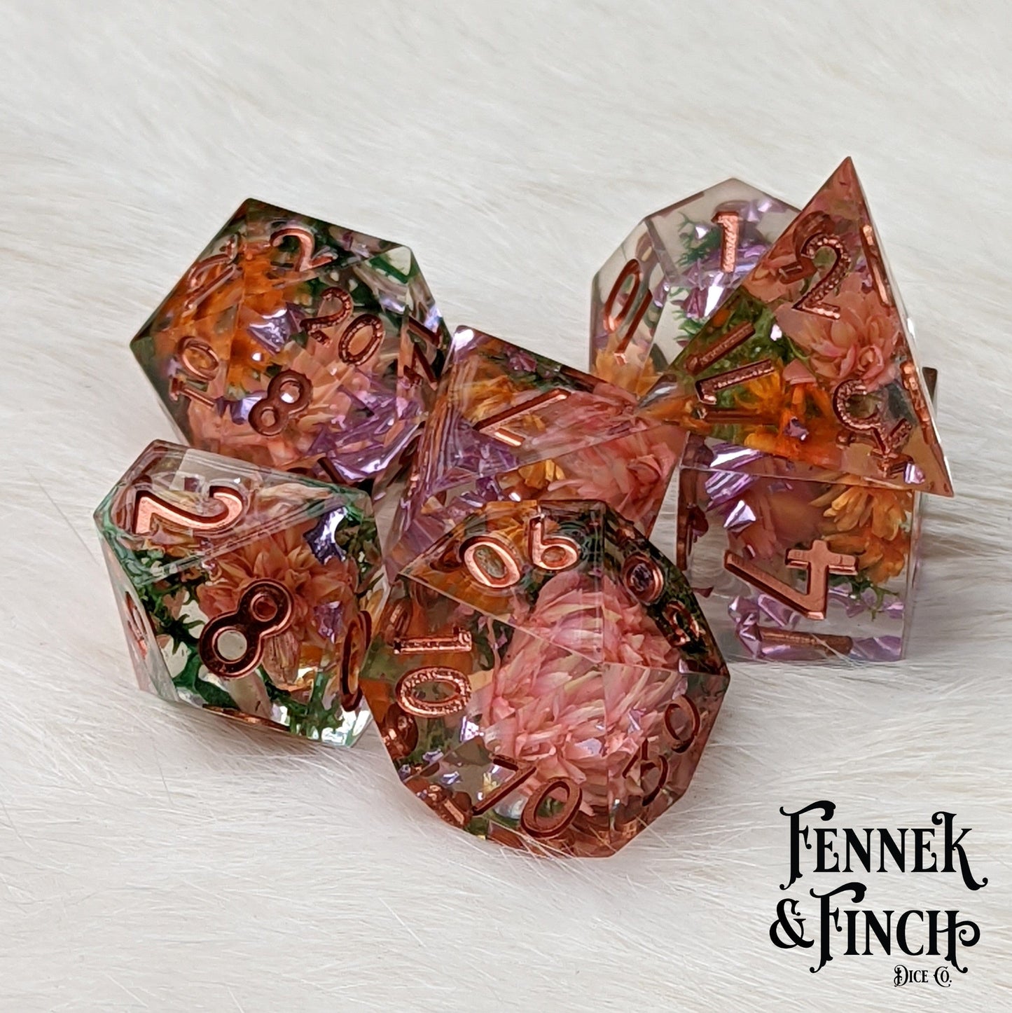Sunny Garden DnD dice set with dried orange and pink flowers inside, featuring sharp edges, perfect for druids or flower lovers