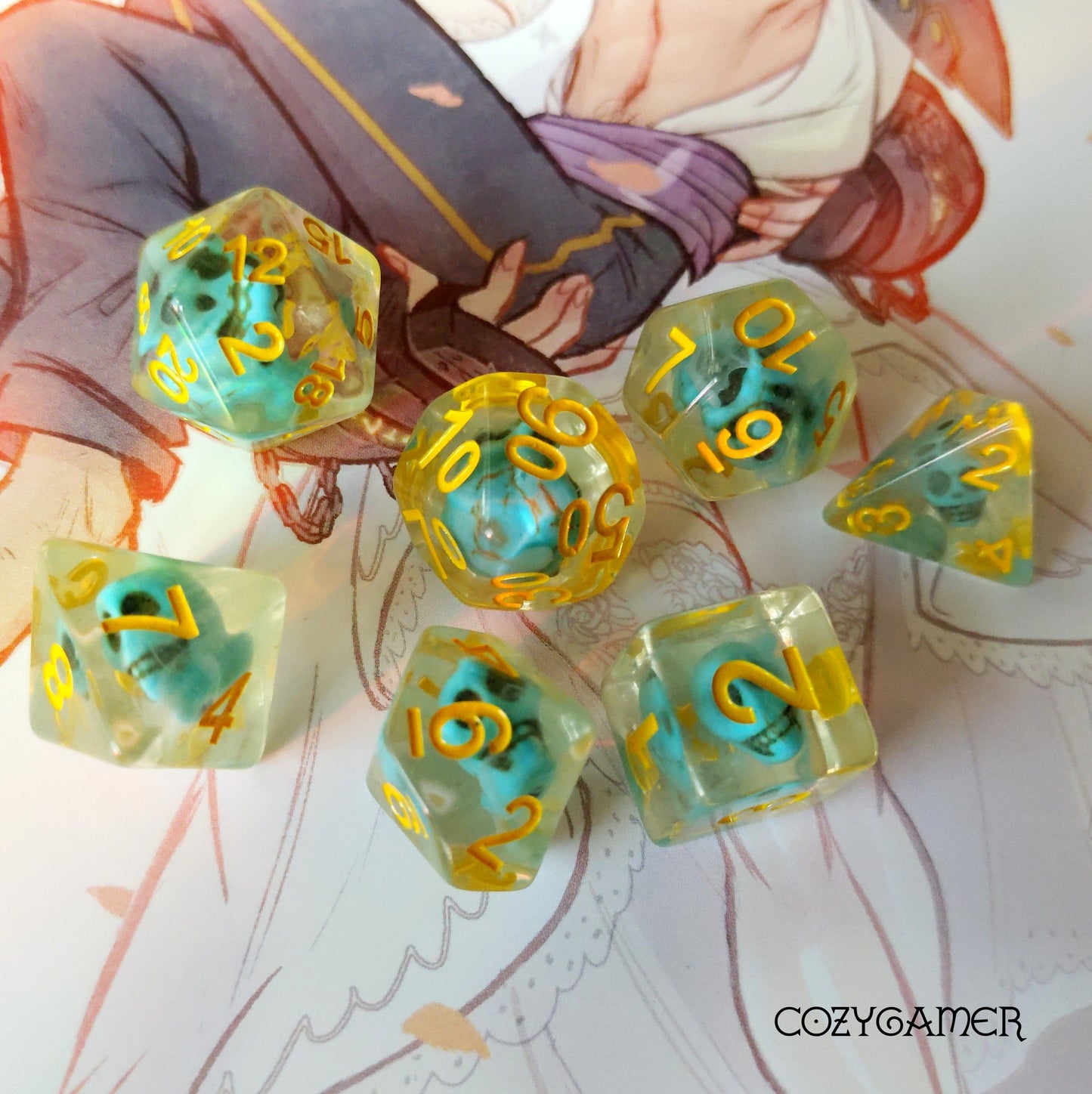 Turquoise Treasure Skull Dice Set with blue skull beads and yellow numbers on a colorful background, ideal for DnD and tabletop RPGs.