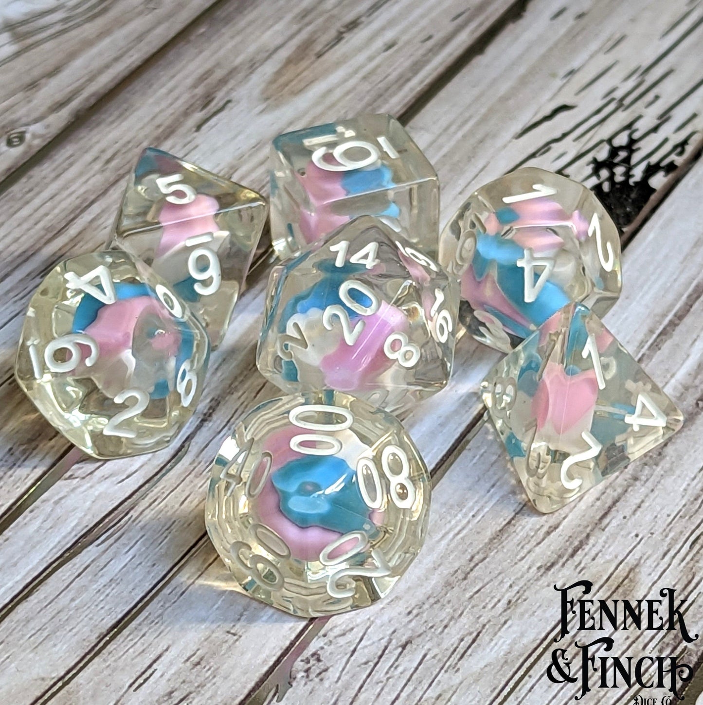 Unicorn Candy Swirl Dice Set with colorful clay candy centers, perfect for tabletop RPG games like Dungeons and Dragons.