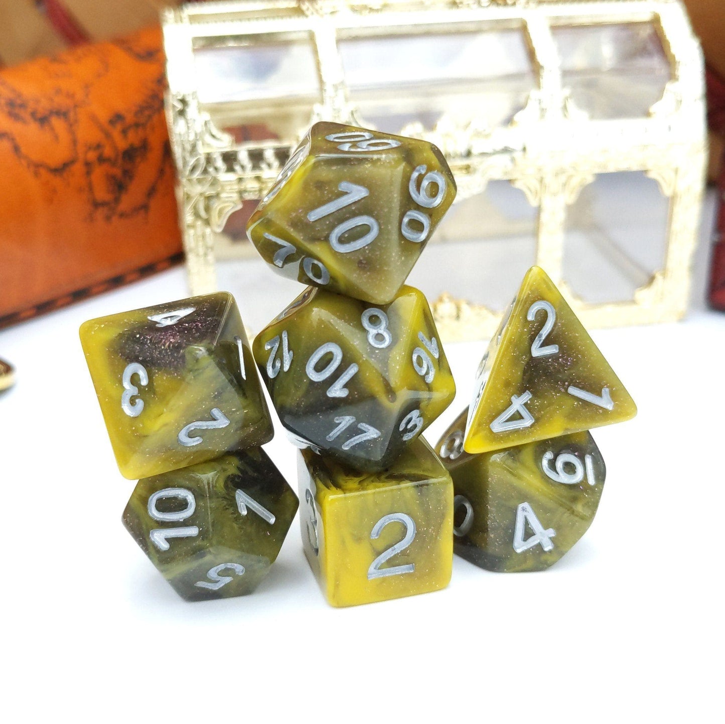 Yellow and grey 7-piece polyhedral dice set for tabletop RPGs like DnD, includes D20, D12, D10, D%, D8, D6, D4.