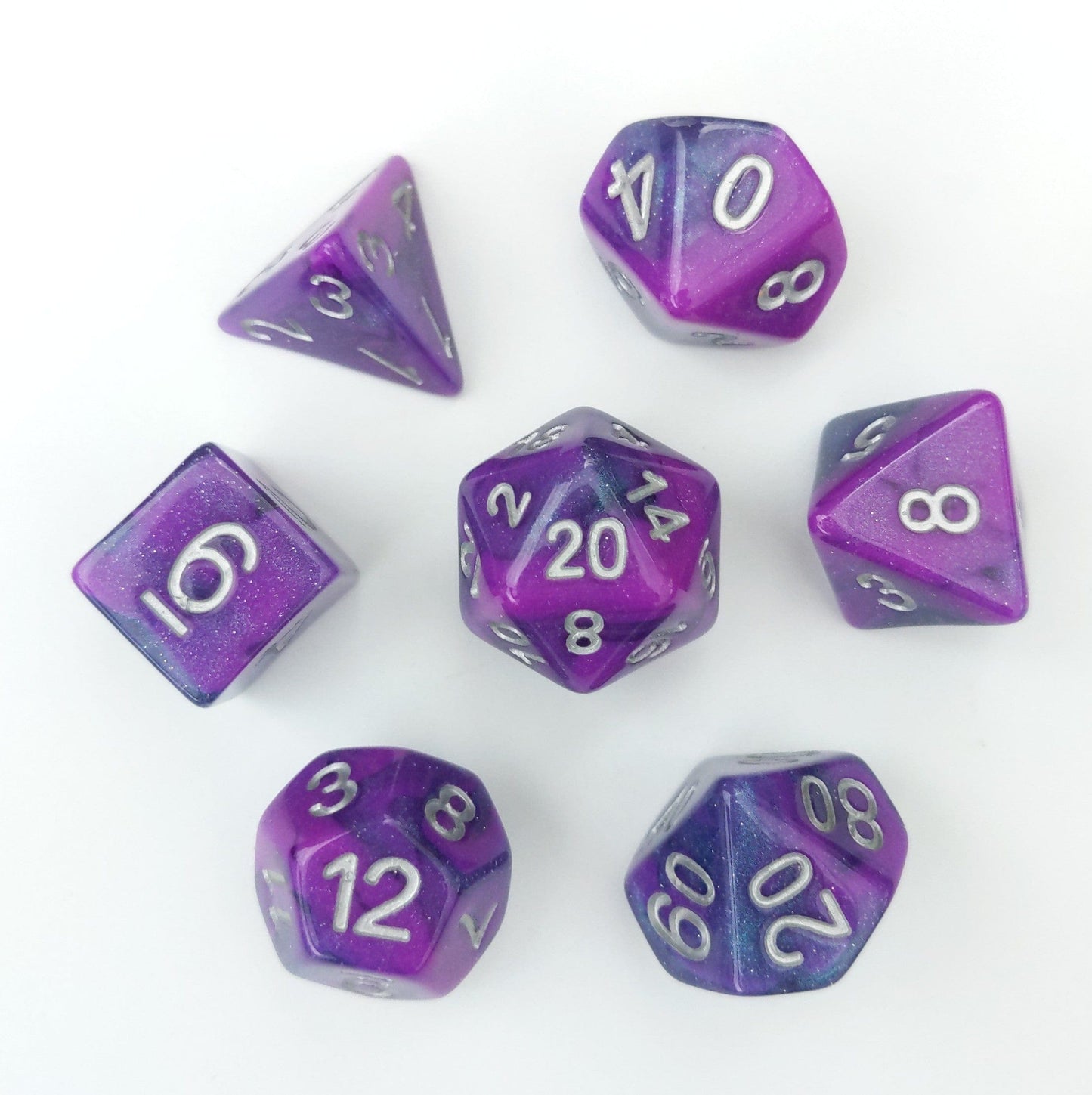 Warlock Flames Dice Set, marbled shimmering purple and blue, silver numbers, 7 pieces for tabletop RPGs like Dungeons and Dragons.