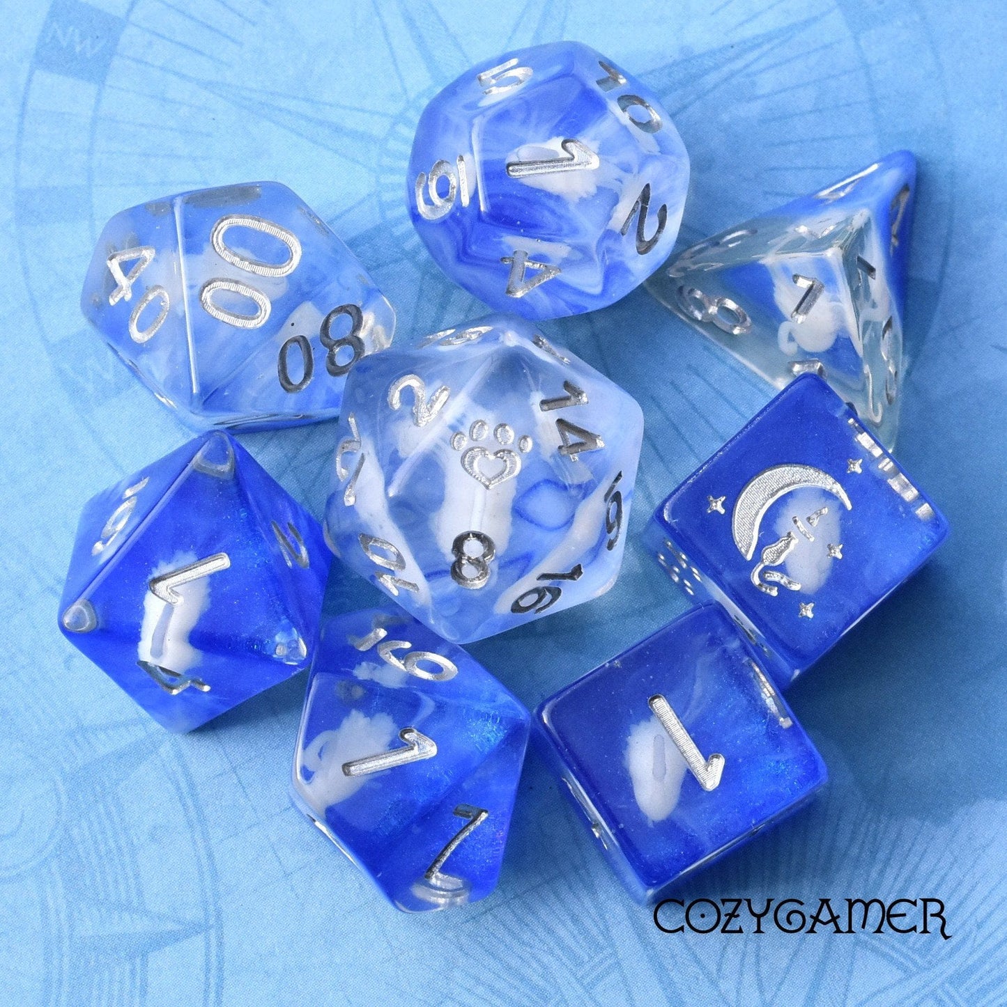 White Swan 8-piece DnD dice set with 3D swans and a cat wizard D6 against a blue background, by CozyGamer.