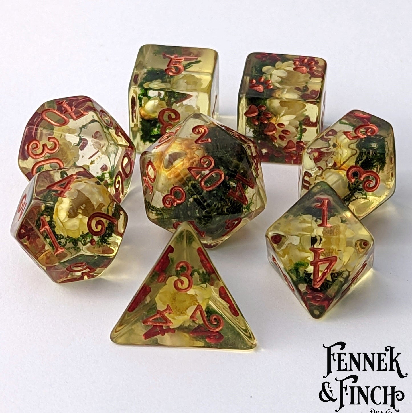Yellow Flowers and Moss DnD Dice Set with real dried flowers inside clear resin, perfect for gamers and collectors.
