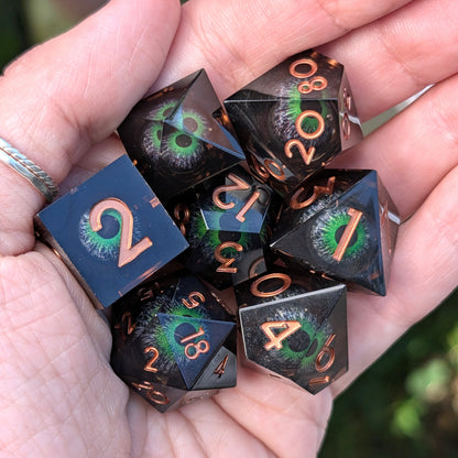 Moving Eye Liquid Core DnD Dice Set - Black & Green - The Hollow Gaze