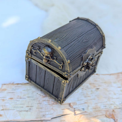 Mimic Treasure Chest Dice Box with wood and metal detailing, featuring a secure latch and skull embellishment.