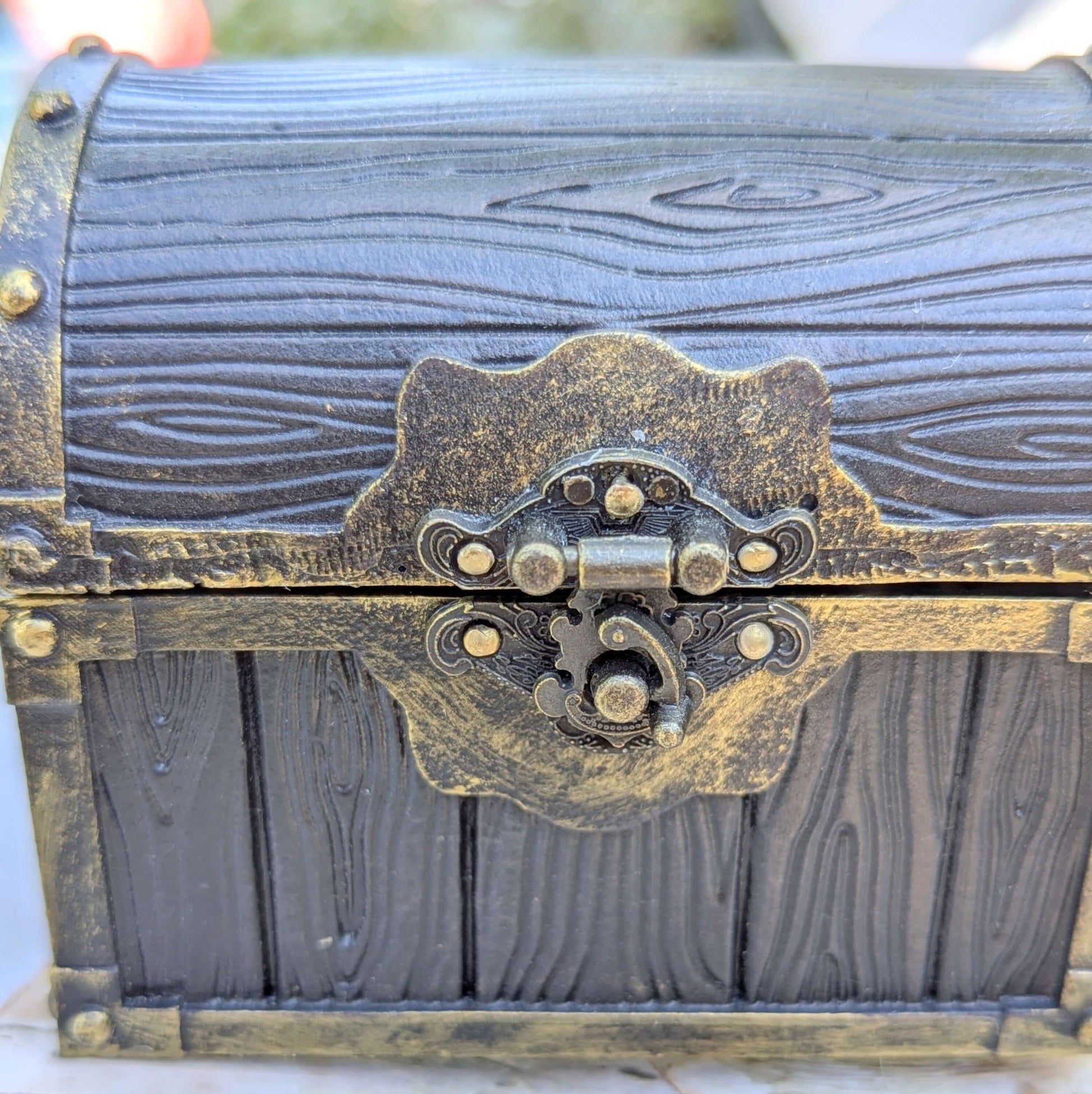 Mimic Treasure Chest Dice Box with wood and metal detailing and ornate latch.