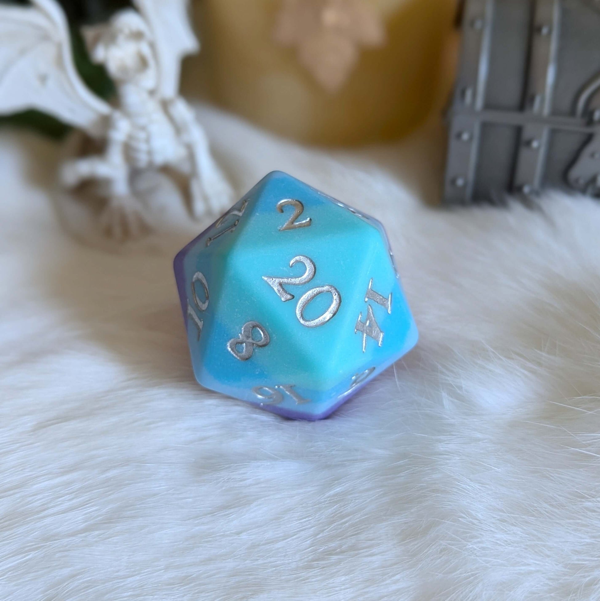 Twilight Serenity Large D20 with teal to purple ombre and silver numbers, on a soft white surface.