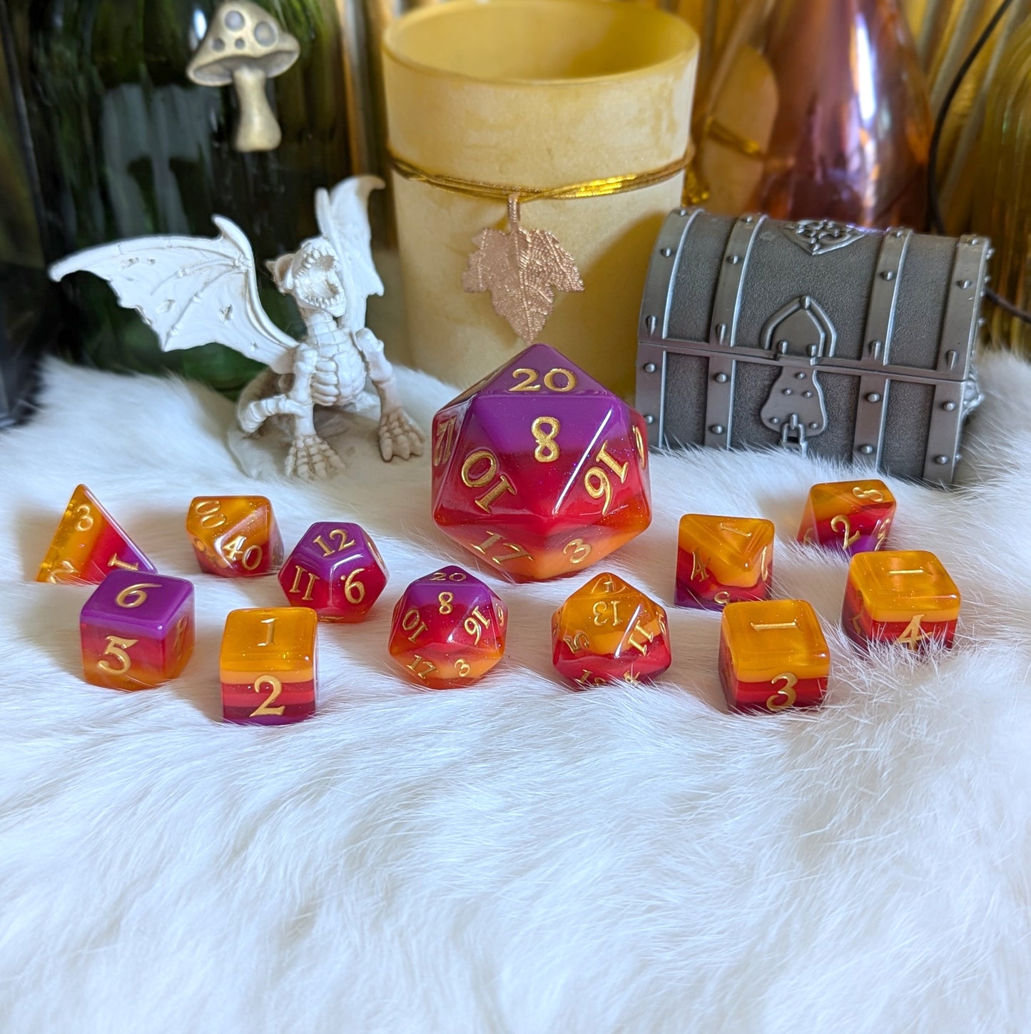 Emberstorm Dice Set with fiery ombre colors from purple to orange on display, perfect for tabletop gaming adventures.