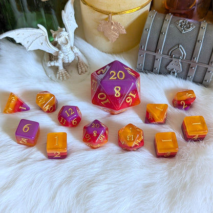 Emberstorm Dice Set with vibrant ombre layers in purple, red, and orange on white fur, surrounded by fantasy decor.