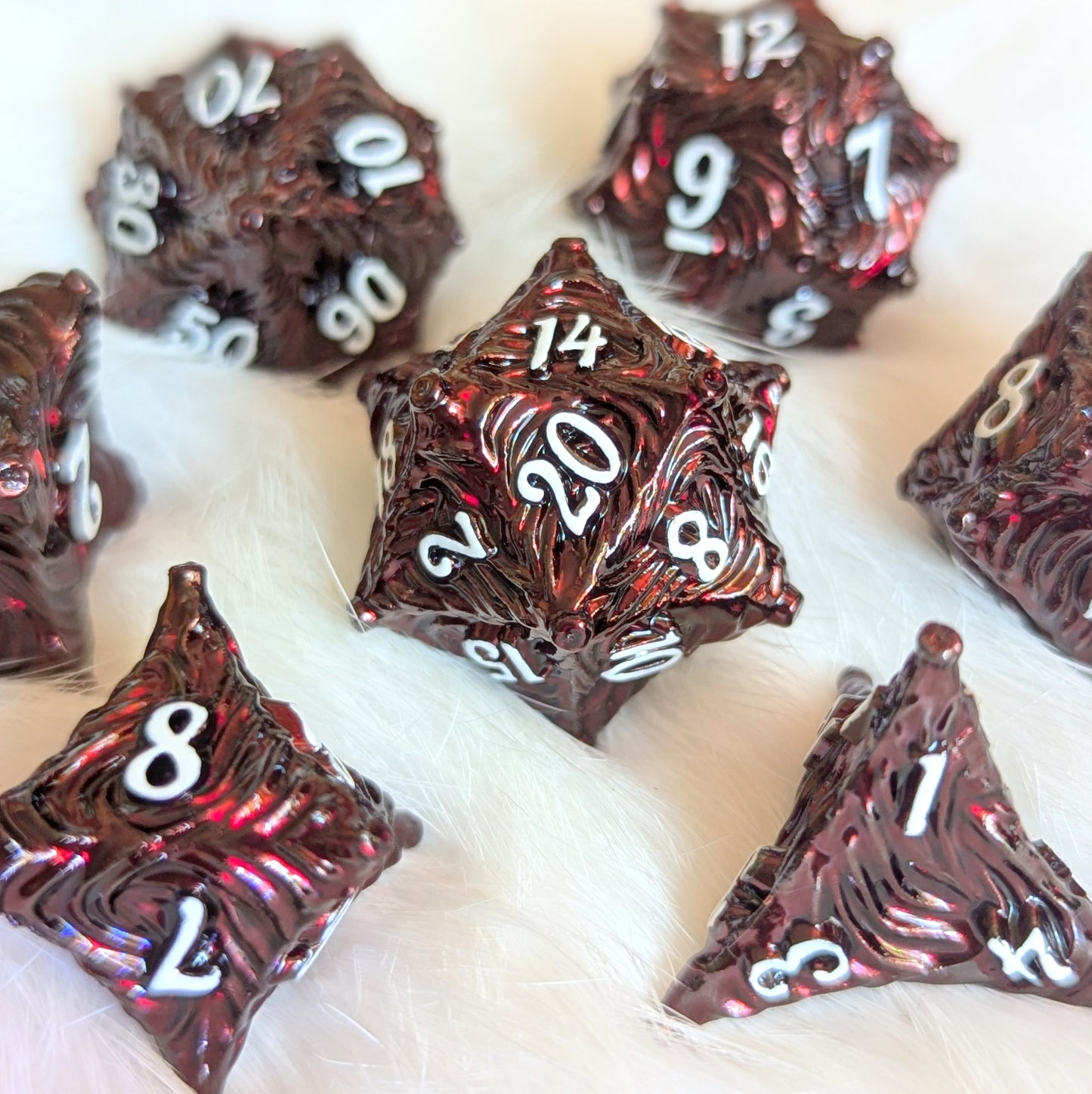 Enchanted Bark Metal Dice Set in Deep Red with white numbers on white background, for tabletop gaming adventures.