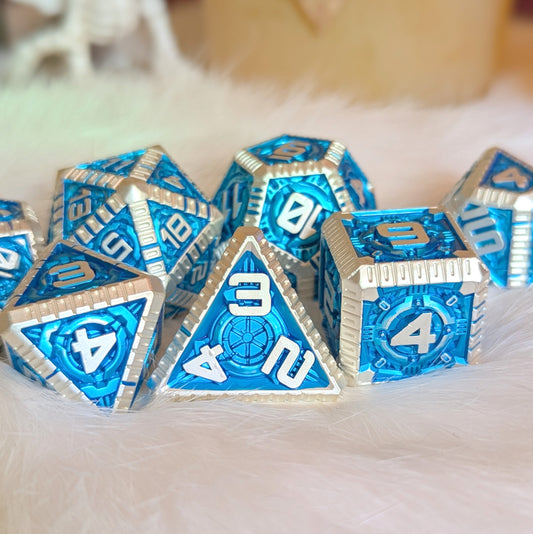 Mechanical Door Metal Dice Set with blue and silver intricate design on fluffy white background, showcasing innovation and mystery.