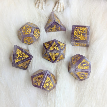 Amethyst Rose Vine Gemstone Dice Set with gold engraved numbers on a soft white background.