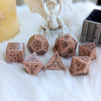 Oak Grove Engraved Rosewood Dice Set with acorn and oak leaf designs displayed on fur background.