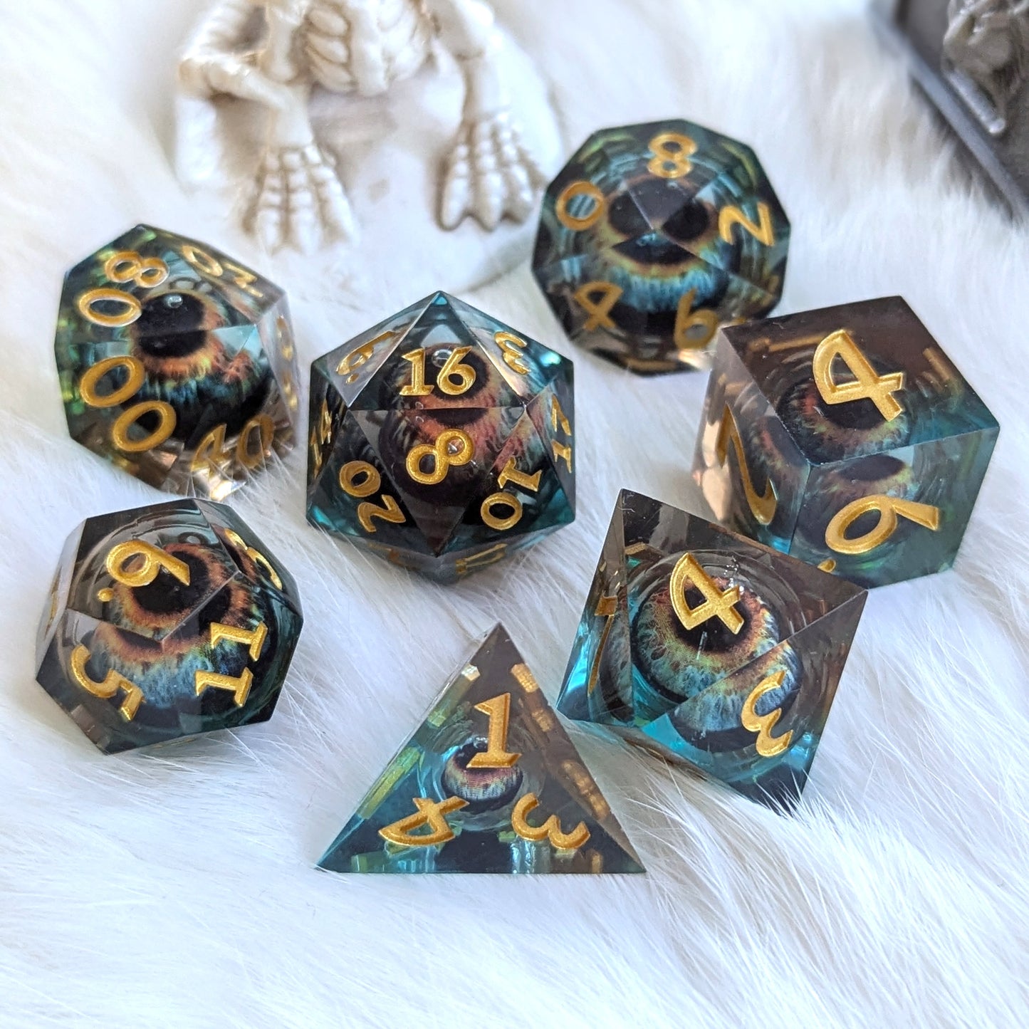 Watcher's Gaze Liquid Core Dice Set with Eye Design in Blue and Black Resin