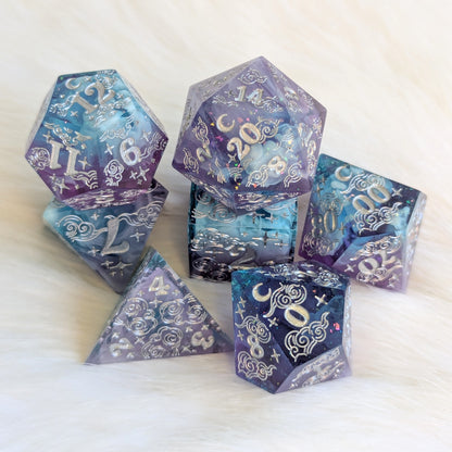 Dreamy Amethyst Sky sharp edge resin dice set featuring purple and blue colors with glitter and intricate engravings.