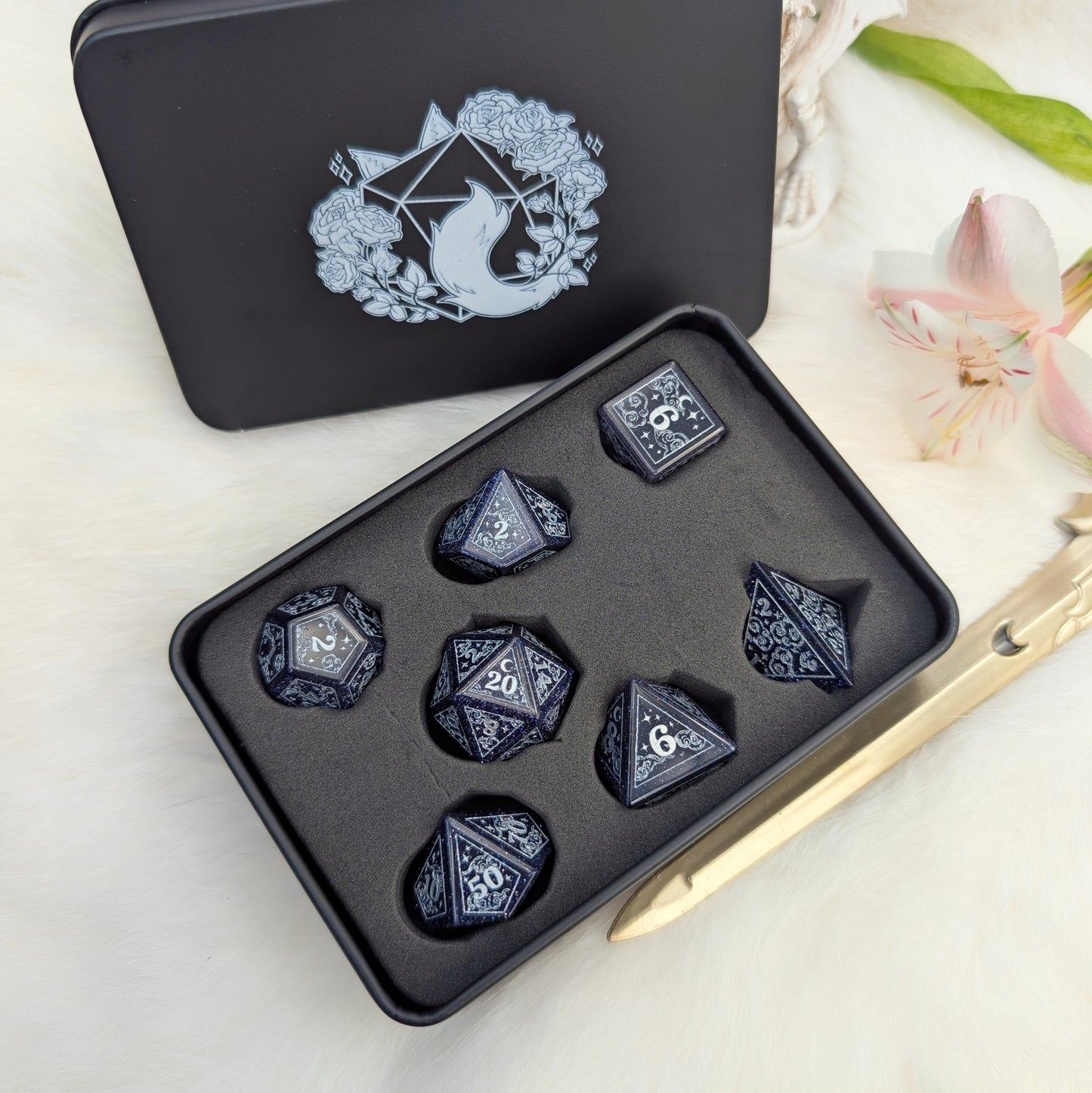 Dreamy Blue Goldstone with Silver Dice Set – 7-Piece Gemstone DnD Dice with Silver Celestial Symbols | Fennek & Finch