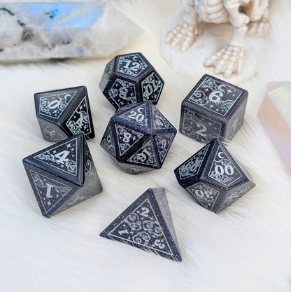 Dreamy Blue Goldstone with Silver Dice Set – 7-Piece Gemstone DnD Dice with Silver Celestial Symbols | Fennek & Finch