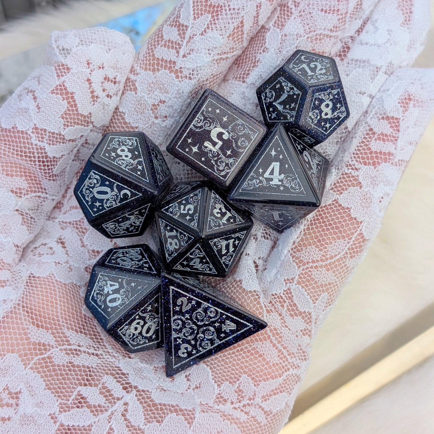 Dreamy Blue Goldstone with Silver Dice Set – 7-Piece Gemstone DnD Dice with Silver Celestial Symbols | Fennek & Finch