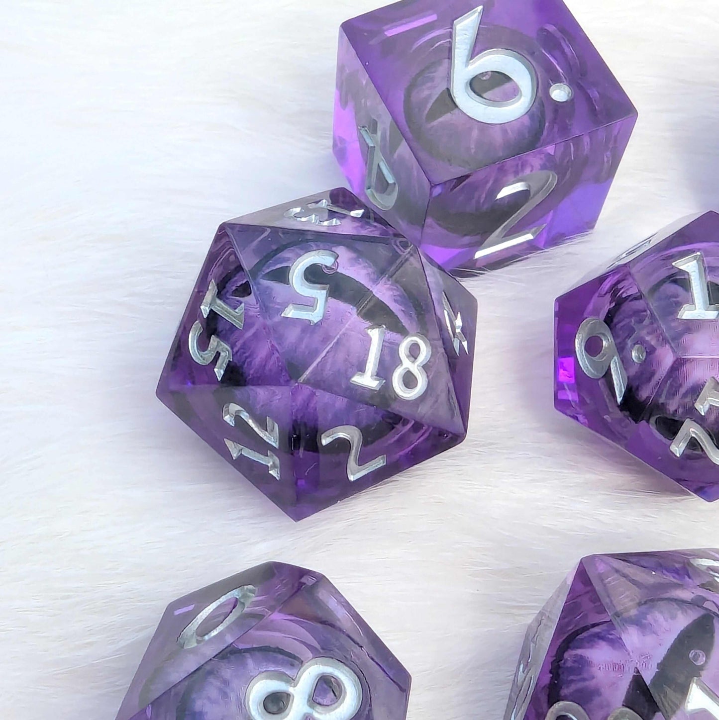 Amethyst Edition All-Seeing Eye Dice Set with purple liquid core and sharp edge resin, featuring a captivating single eye design.