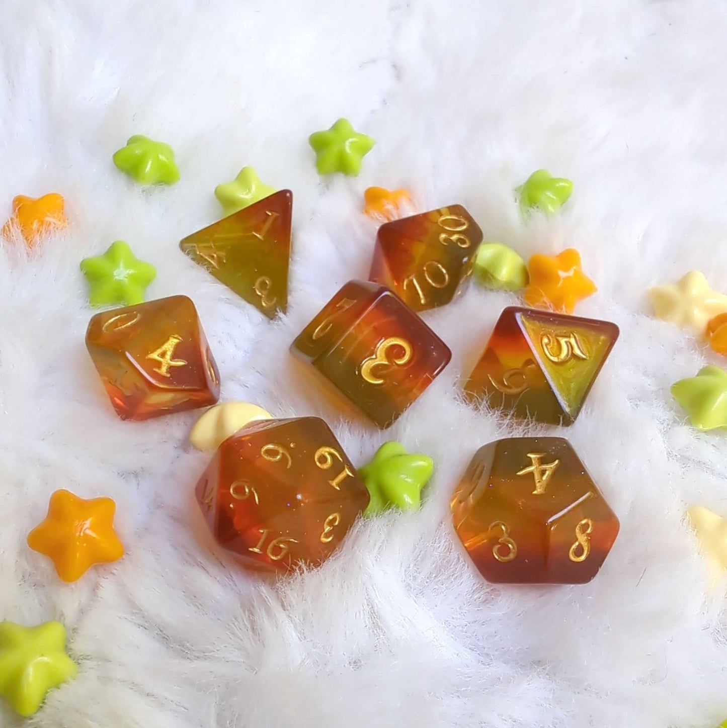 Autumn Sparkles TTRPG Dice Set with vibrant fall colors and glitter on soft background