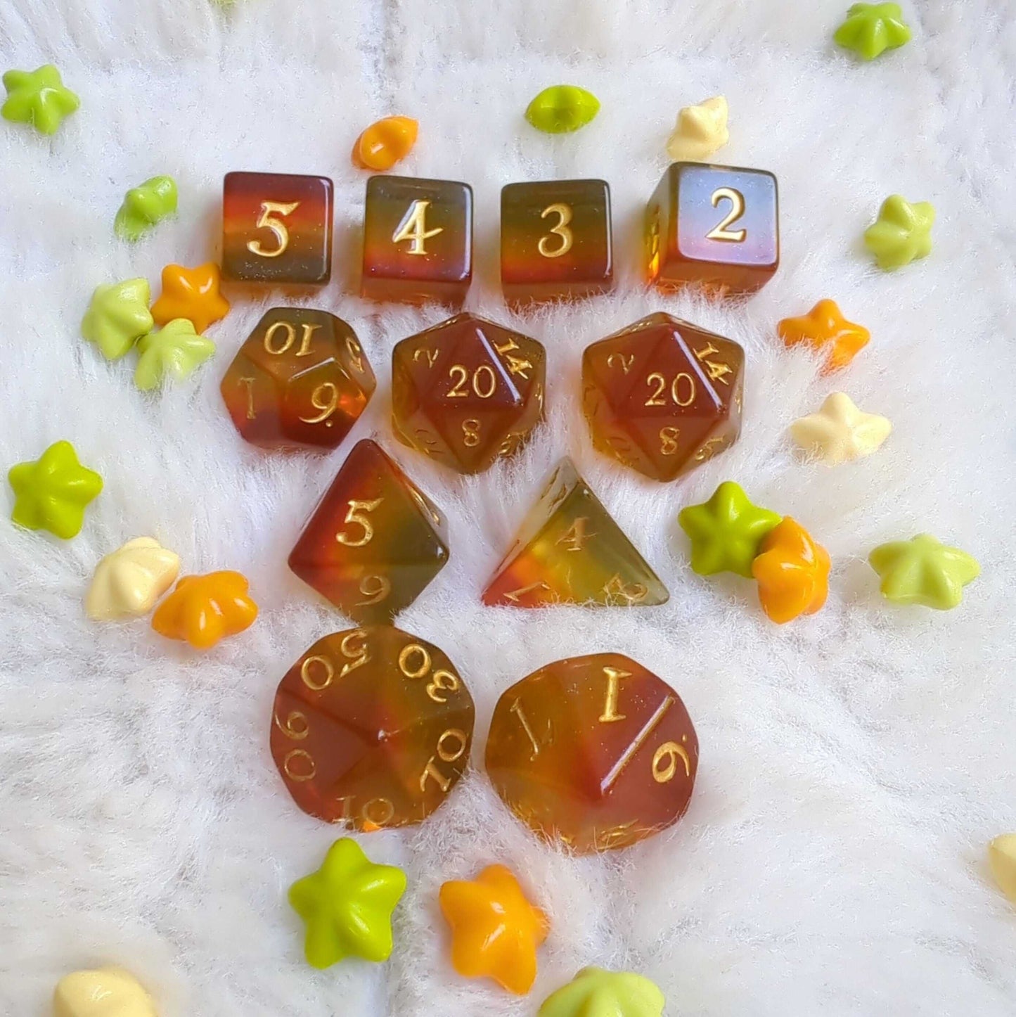 Autumn Sparkles Dice Set featuring vibrant fall hues and glitter, perfect for TTRPG gaming.