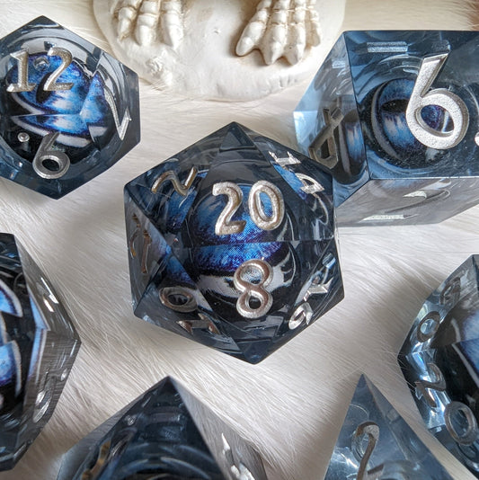 Blue and White Moving Eye Liquid Core Sharp Edge Resin DnD Dice Set