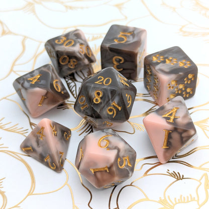 Caramel Macchiato Dice Set with chocolate and caramel swirls, featuring 8-piece TTRPG dice on floral background.