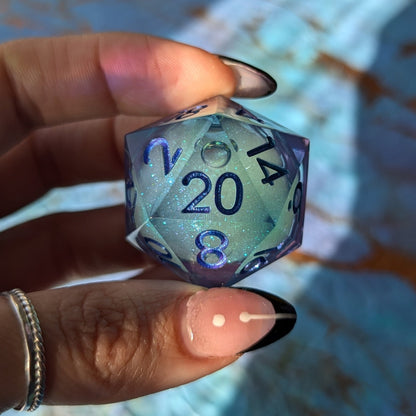 Celestial Drift Liquid Core D20 – 1.5" Purple Blue Iridescent Micro - Glitter Die - Fennek and Finch