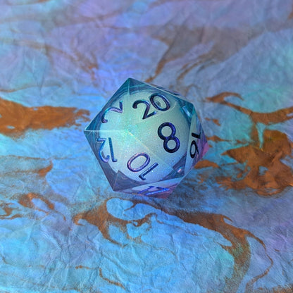 Celestial Drift Liquid Core D20 – 1.5" Purple Blue Iridescent Micro - Glitter Die - Fennek and Finch