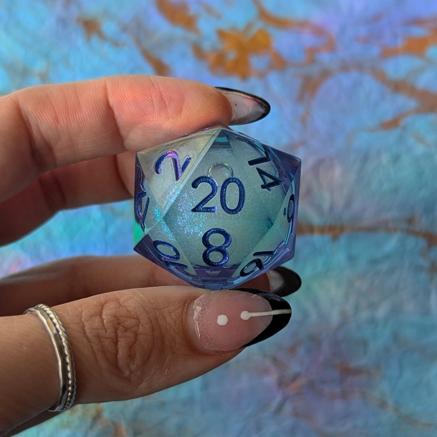 Celestial Drift Liquid Core D20 – 1.5" Purple Blue Iridescent Micro - Glitter Die - Fennek and Finch