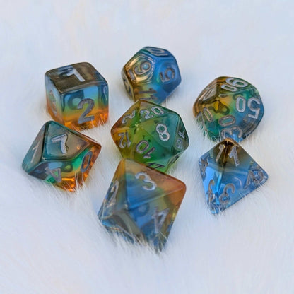 Rainbow layered Cocktail Dice Set for TTRPG, multicolored resin with silver numbers, perfect for Dungeons & Dragons.