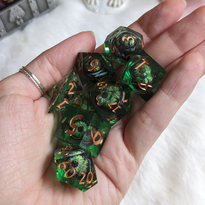 Dark Green Moving Eye Liquid Core Sharp Edge Dice Set – 7-Piece Watching DnD Dice Sets & Games Fennek and Finch