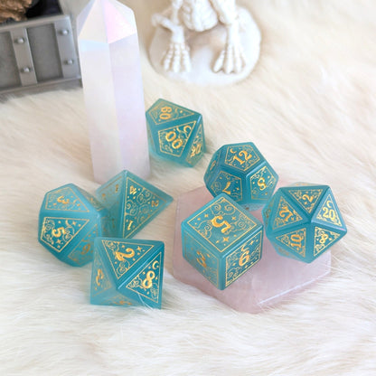 Dreamy Blue Cat's Eye Glass Dice Set – 7 - Piece Celestial DnD Dice with Gold Symbols | Fennek & Finch - Fennek and Finch
