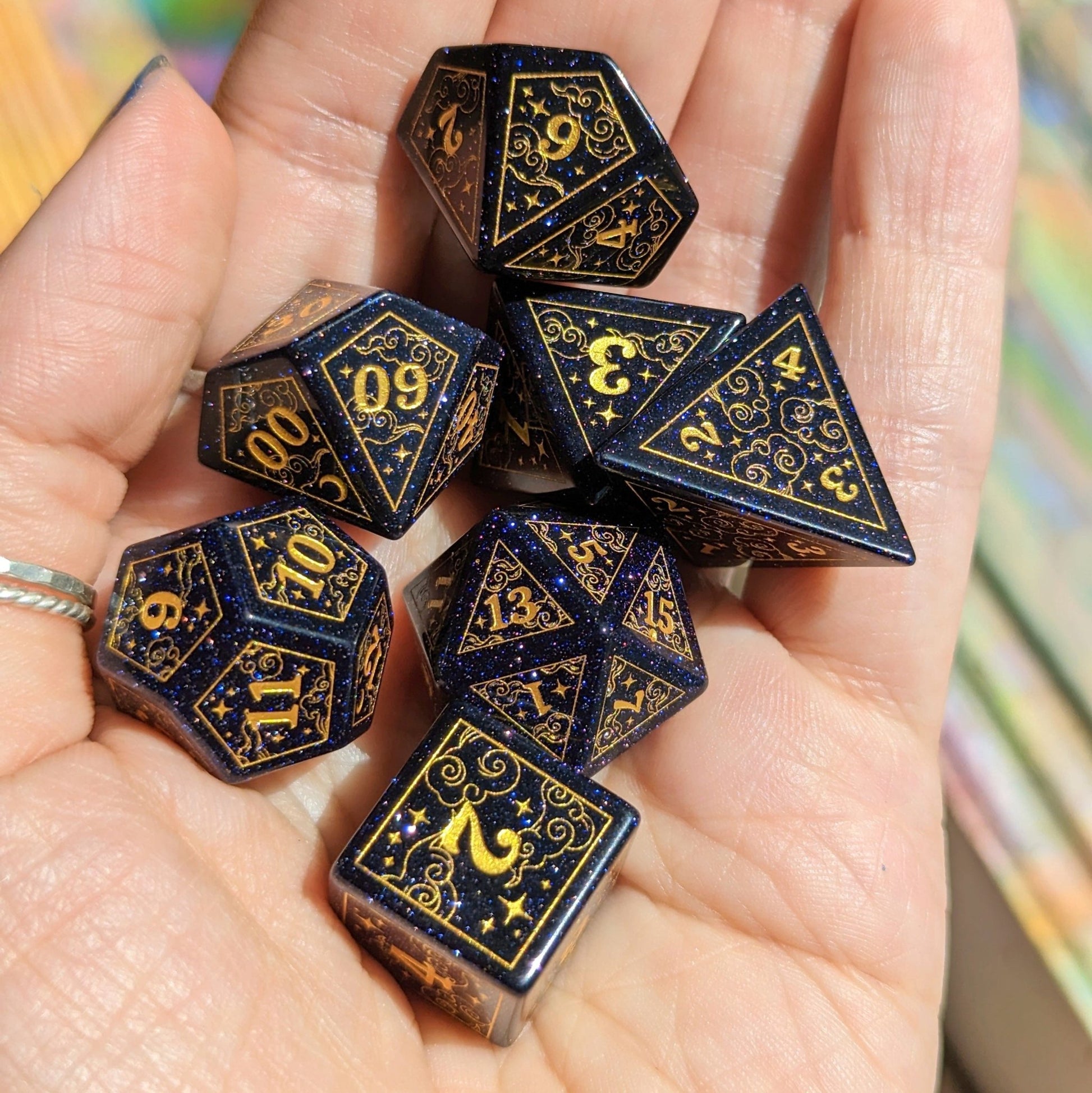 Dreamy Blue Sandstone Dice Set – 7 - Piece Gemstone DnD Dice with Gold Celestial Symbols | Fennek & Finch - Fennek and Finch