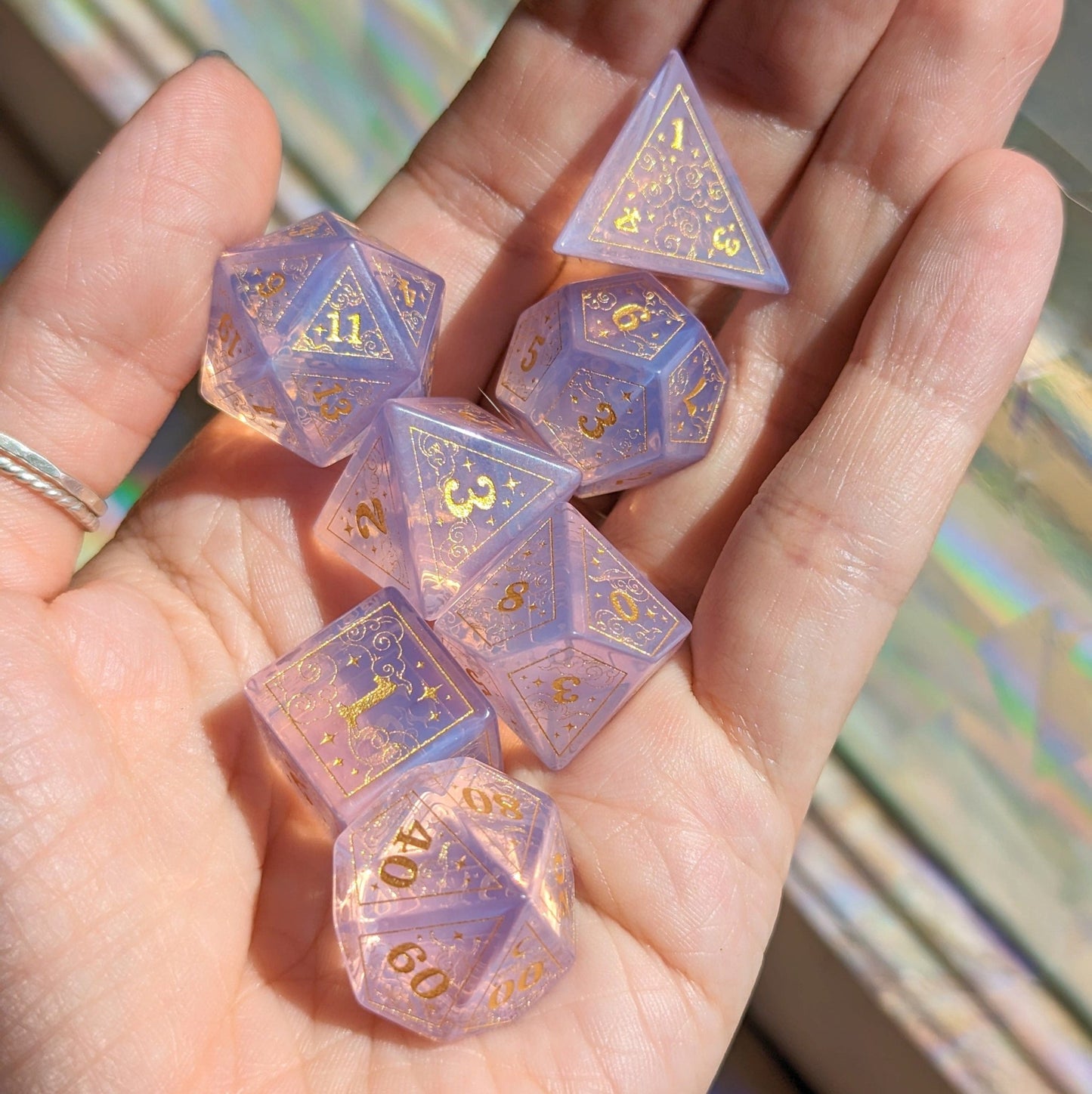 Dreamy Purple Opalite Dice Set – 7 - Piece Gemstone DnD Dice with Gold Celestial Symbols | Fennek & Finch - Fennek and Finch
