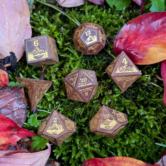 Everwild Rosewood Dice Set – Mountains & Forest Engravings with Gold Paint Fill (7 - Piece) - Fennek and Finch