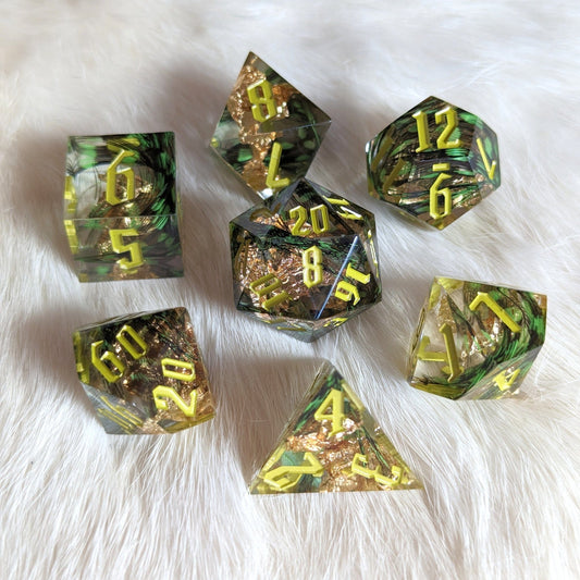 Green Feather Sharp Edge Dice Set – 7 - Piece Gold Foil Fantasy Font DnD Dice - Fennek and Finch