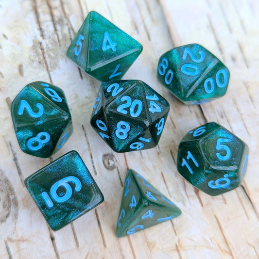 Lake Bottom Dice Set in sparkly blue and green with round edges, featuring a mystical underwater shimmer effect for tabletop RPGs.