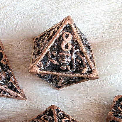 Medusa Hollow Metal Dice Set – 7 - Piece Snake Face DnD Dice - Fennek and Finch