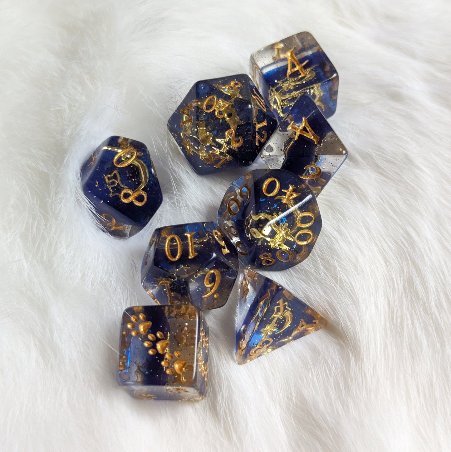 Moon and Stars Dice Set with glittering resin, gold numbers, eight polyhedral dice including extra D6, perfect for TTRPGs.