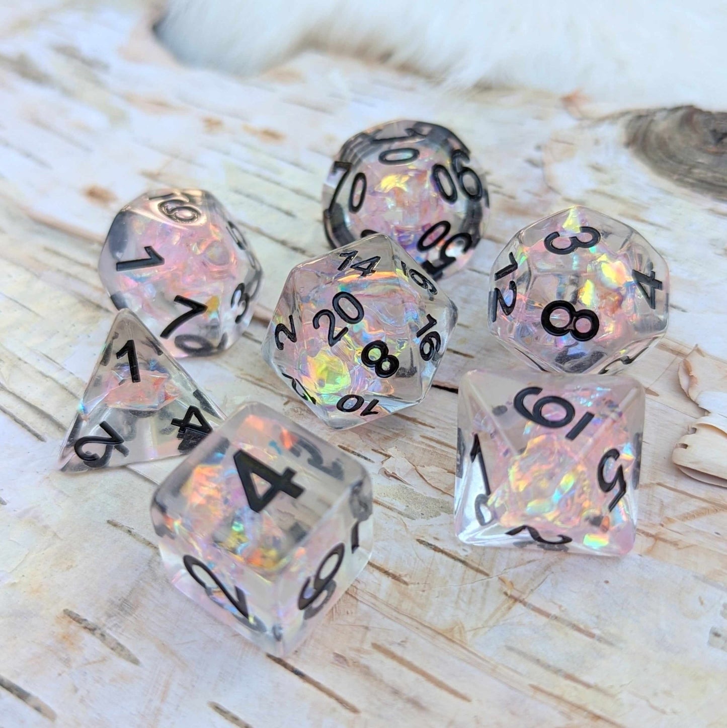 Moonlight Fantasy Dice Set – Clear Resin with Pink Iridescent Cellophane & Black Font - Fennek and Finch