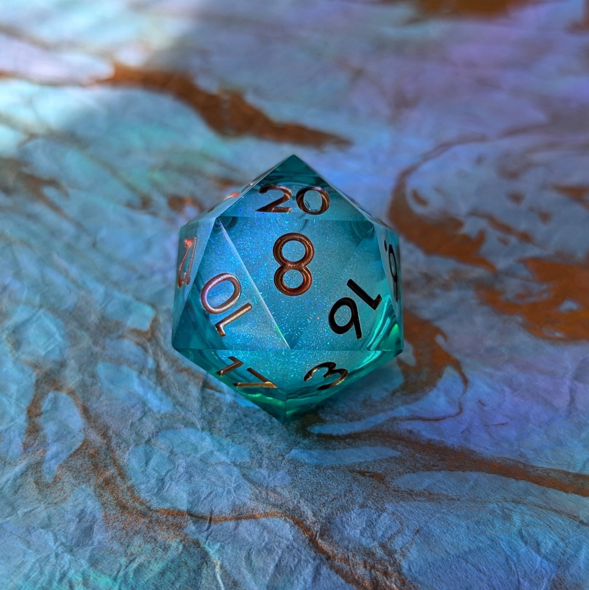 Ocean's Heart Liquid Core D20 – 1.5" Deep Blue Green Swirling Shimmer Die Dice Sets & Games Fennek and Finch