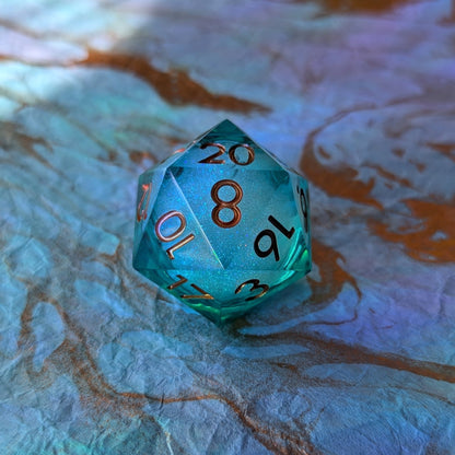 Ocean's Heart Liquid Core D20 – 1.5" Deep Blue Green Swirling Shimmer Die Dice Sets & Games Fennek and Finch